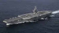 Kapal induk AS dan pemimpin formasi carrier strike group ke-8 AL AS, USS Abraham Lincoln (US Navy / Creative Commons)