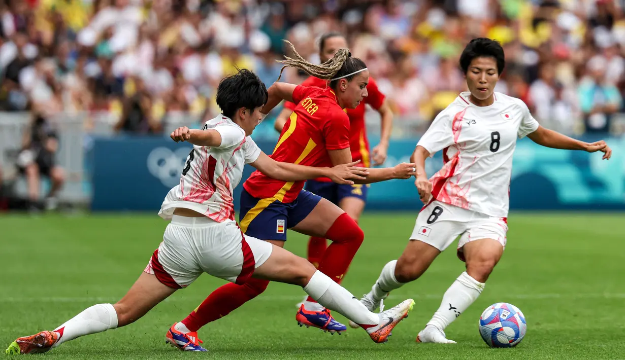 Kemenangan atas Jepang membuat Spanyol memuncaki Grup C dengan tiga poin. (ALAIN JOCARD/AFP)