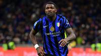 Di sisa waktu pertandingan, pada menit ke-90+2, gol Marcus Thuram menggandakan sekaligus mengunci kemenangan Inter Milan atas Como. (Piero CRUCIATTI/AFP)