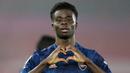 Bukayo Saka merupakan pemain Arsenal yang saat ini memiliki nilai banderol sebesar 65 juta euro. Dirinya tercatat mengalami kenaikan dari awal tahun 2021 sebanyak 40 juta euro. (Foto: AFP/Pool/Frank Augstein)