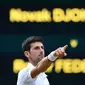 Ekspresi petenis Serbia, Novak Djokovic, setelah mengalahkan Roger Federer, pada final Wimbledon 2019, Minggu (14/7/2019). (AFP/Daniel Leal-Olivas)