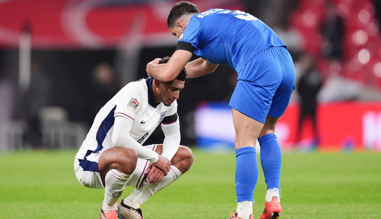 Pemain Timnas Inggris, Jude Bellingham, menjadi salah satu pemain yang cukup terpukul dengan kekalahan dari Yunani dalam duel lanjutan Grup F UEFA Nations League B 2024/2025. (John Walton/PA via AP)