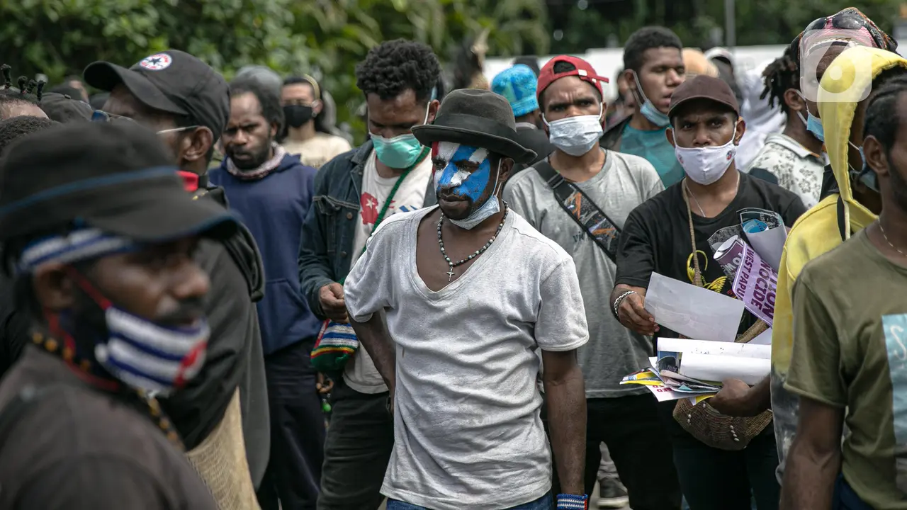 FOTO: Aliansi Mahasiswa Papua Gelar Aksi di Kawasan Patung Kuda
