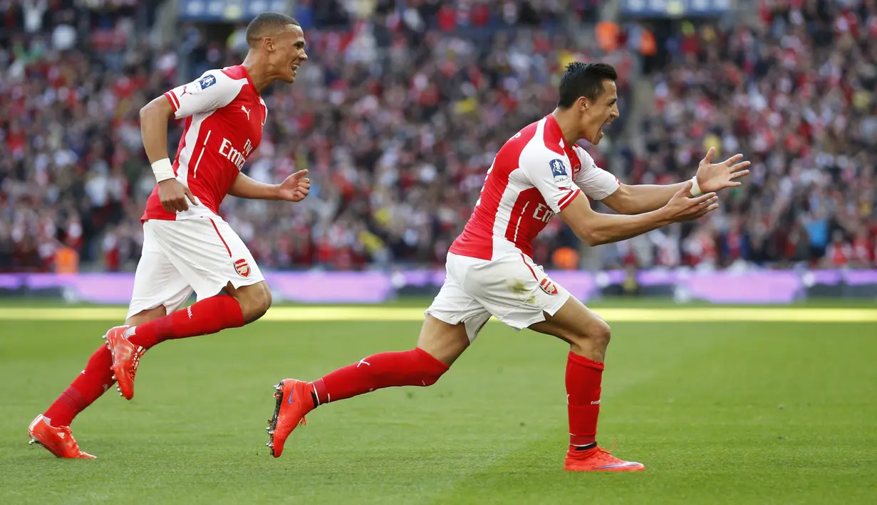 Selebrasi striker Alexis Sanches usai mencetak gol pembuka di menit ke-40