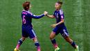 Penyerang Jepang, Yuki Ogimi (kanan) melakukan selebrasi bersama Mizuho Sakaguchi usai mencetak gol di final Piala Dunia wanita di BC Place, Vancouver, Kanada, Senin (6/7/2015). Amerika mengalahkan Jepang dengan skor 5-2. (Reuters/Erich Schlegel)