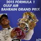 Pebalap Mercedes GP, Lewis Hamilton, meraih kemenangan ketiganya musim ini di GP Bahrain. (photo by AFP/MARWAN NAAMANI)