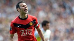 Ryan Giggs (162 assist) - Giggs merupakan gelandang terbaik yang pernah dimiliki Manchester United. Tercatat, Giggs telah menghasilan 162 assist selama bermain di Premier League. (AFP/Paul Ellis)