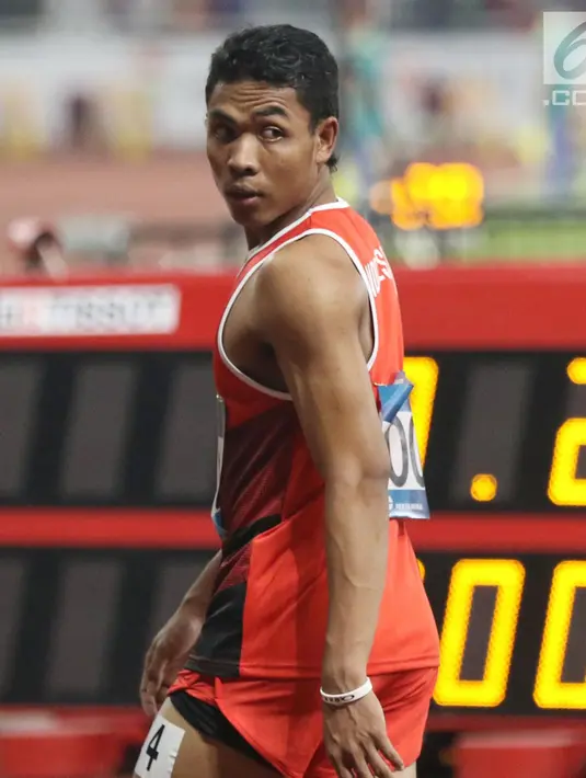 Pelari cepat Indonesia, Lalu Muhammad Zohri usai kualifikasi lari 100 meter Asian Games 2018 di Stadion GBK, Jakarta, Sabtu (25/8/2018). Lalu M Zohri mencatat waktu 10,27 detik dan berhak tampil di semifinal. (Liputan6.com/Helmi Fithriansyah)