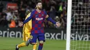 Penyerang Barcelona, Lionel Messi berselebrasi usai mencetak gol ke gawang Celta Vigo pada pertandingan lanjutan La Liga Spanyol di stadion Camp Nou (9/11/2019). Messi mencetak hattrick dipertandingan ini dan mengantar Barcelona menang telak 4-1 atas Vigo. (AP Photo/Joan Monfort)