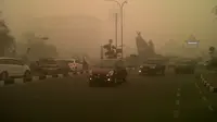 Kantor Gubernur Riau tak terlihat ditelan kabut asap (Liputan6.com/M Syukur)