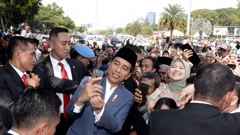 Presiden Joko Widodo atau Jokowi yang menggelar open house di Istana Negara, Rabu (6/5/2019)