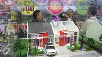 Sebuah miniatur rumah terlihat saat pameran Property Week 2015 di Jakarta, Kamis (17/9/2015). 140 pengembang mengisi pameran tersebut dan di harapkan dapat mengembalikan dinamisme industri properti di dalam negeri. (Liputan6.com/Angga Yuniar)
