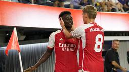 Arsenal menang atas Barcelona dengan skor 5-3. (AP Photo/Ashley Landis)