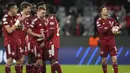 Kemenangan 7-1 ini membuat Bayern Munchen lolos ke babak perempatfinal Liga Champions 2021/2022 dengan agregat 8-2. (AP/Matthias Schrader)