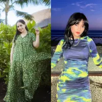 Berpose layaknya model, Nagita Slavina tampil menawan dalam balutan maxi dress hijau bermotif floral. [Foto: IG/raffinagita1717].