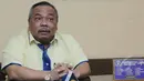 Ketua DPP Partai Golkar kubu Agung Laksono, Leo Nababan, memberi keterangan pers di Kantor DPP Partai Golkar, Jakarta, Selasa (5/5/2015). Leo mempertanyakan rencana DPR merevisi Undang-Undang Parpol dan Undang-Undang Pilkada. (Liputan6.com/Helmi Afandi) 