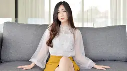 Pemilik nama lengkap Patricia Cynthian Sunartio mulai tertarik menjadi beauty vlogger setelah bertemu vlogger Michelle Phan, kemudian terinspirasi ingin membuat video seperti Michelle. (Liputan6.com/IG/@cynthiansunartio)