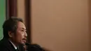 Jumpei Yasuda, jurnalis lepas Jepang yang sempat ditahan 3 tahun di Suriah, menggelar konferensi pers di Tokyo, Jumat (2/11). Yasuda mengadakan konferensi pers untuk menjelaskan sebanyak mungkin tentang apa yang terjadi padanya. (Toshifumi KITAMURA/AFP)