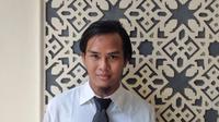 Penyandang Tuli Muhammad Erwin Althaf berhasil raih gelar magister di UI. Foto dokumentasi pribadi.