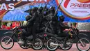 Serangkaian acara formal seperti upacara dan parade defile dan pertunjukan marching band Akademi Kepolisian serta terjun payung akan memeriahkan puncak peringatan HUT ke-78 Bhayangkara di Jakarta. (CHAIDEER MAHYUDDIN/AFP)
