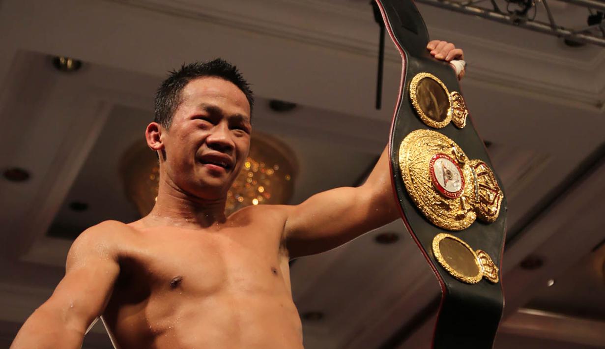 Petinju Indonesia, Daud Yordan, merebut gelar interim WBA International kelas ringan setelah menang angka mutlak atas petinju Argentina, Cristian Rafael Coria, di Radisson Victoria Plaza, Monteviedo, Uruguay, Sabtu (4/6/2016). (Daud Yordan Media)