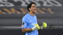 4. Yassine Bounou - Kiper asal Maroko ini menjadi andalan Sevilla di bawah mistar gawang pada ajang Liga Europa. Bounou tercatat melakukan sejumlah penyelamatan gemilang saat sevila berjumpa Manchester United. (AFP/Ina Fassbender/pool)