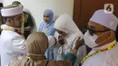 Suasana pernikahan anak narapidana terorisme (napiter) di Rumah Tahanan Polda Metro Jaya, Sabtu (14/5/2022). Dentasemen Khusus (Densus) 88 Polri bekerjasama dengan Satuan Perawatan Tahanan dan Barang Bukti (Sat Tahti) memfasilitasi pernikahan anak narapidana terorisme (napiter) Husein Hasny (Habib Husein). (Liputan6.com/Herman Zakharia)