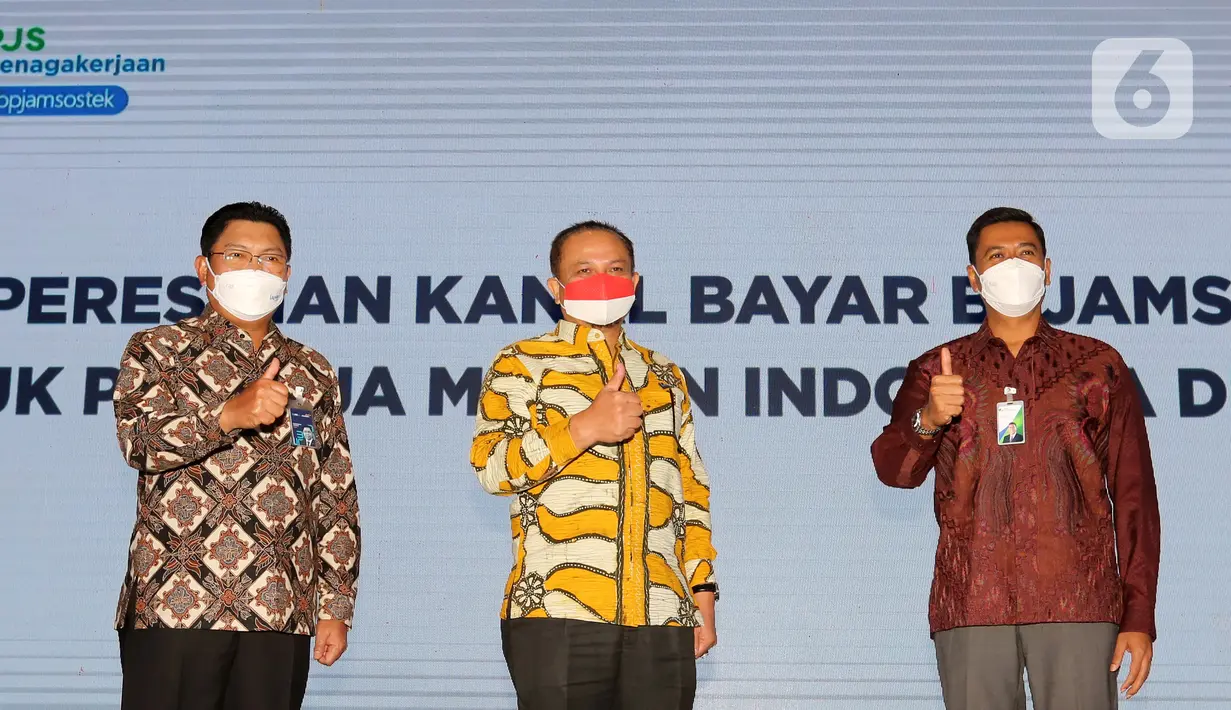 Bank Mandiri melalui Mandiri International Remittance (MIR) melayani pembayaran iuran BPJamsostek bagi PMI di Malaysia agar lebih mudah dan cepat. PMI hanya perlu melakukan registrasi pada website BPJamsostek untuk mendapatkan kode pembayaran. (Liputan6.com/Fery Pradolo)