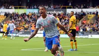 Striker Manchester United atau MU Mason Greenwood merayakan golnya ke gawang Wolverhampton Wanderers pada match day ketiga Liga Inggris di Stadion Molineux, Minggu, 29 Agustus 2021. (Oli SCARFF / AFP)