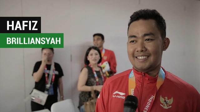 Berita video komentar Hafiz Briliansyah ganda putra Indonesia usia meraih emas pertama untuk Indonesia di Asian Para Games 2018.