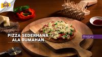 Suka makan pizza? Jangan beli, bikin sendiri aja di rumah. Ini Bintang Tasty kasih resep mudahnya. (Foto: Bintang.com/Daniel Kampua, Digital Imaging: Bintang.com/Muhammad Iqbal Nurfajri)