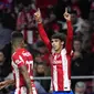 Penyerang Atletico Madrid, Joao Felix melakukan selebrasi usai mencetak gol ke gawang Manchester United pada pertandingan leg pertama babak 16 besar Liga Champions di Stadion Wanda Metropolitano, Kamis (24/2/2022). Atletico bermain imbang atas Manchester United 1-1. (AP Foto/Manu Fernandez)