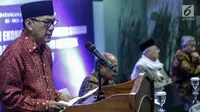 Gubernur Bank Indonesia (BI) Agus Martowardoyo memberi sambutan saat penandatanganan nota kesepahaman (Mou) dengan MUI, Baznas, dan BWI di Gedung MUI, Jakarta, Rabu (24/1). (Liputan6.com/Faizal Fanani)