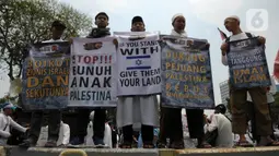 Massa menyampaikan orasi agar Amerika Serikat berhenti membantu Israel. (merdeka.com/Imam Buhori)