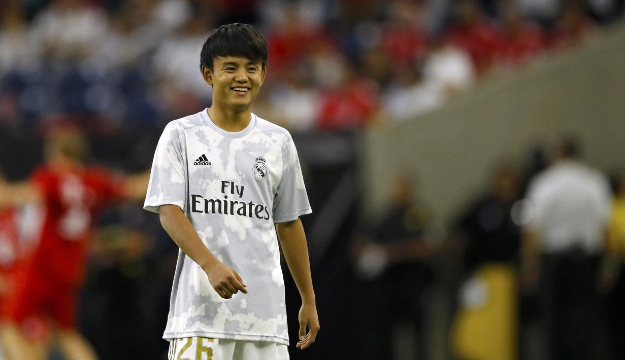 Takefusa Kubo direkrut Real Madrid pada musim panas 2019 lalu. Sadar bahwa wonderkid tersebut bakal kesulitan bersaing di tim utama, Los Blancos segera meminjamkannya ke Mallorca selama semusim untuk pengembangan diri. (AFP/Aaron M Sprecher)