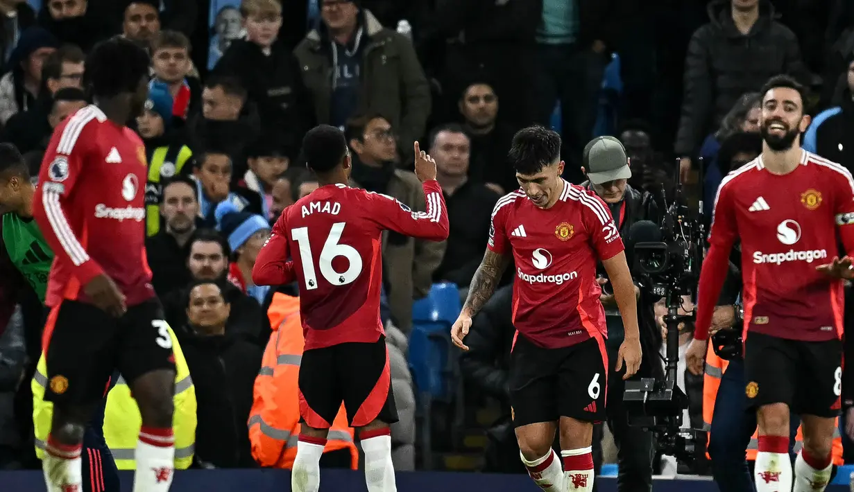 Bertandang ke markas Manchester City, Manchester United tampil cemerlang dan meraih kemenangan sensasional di laga pekan ke-16 Liga Inggris 2024/2025. (Paul ELLIS/AFP)