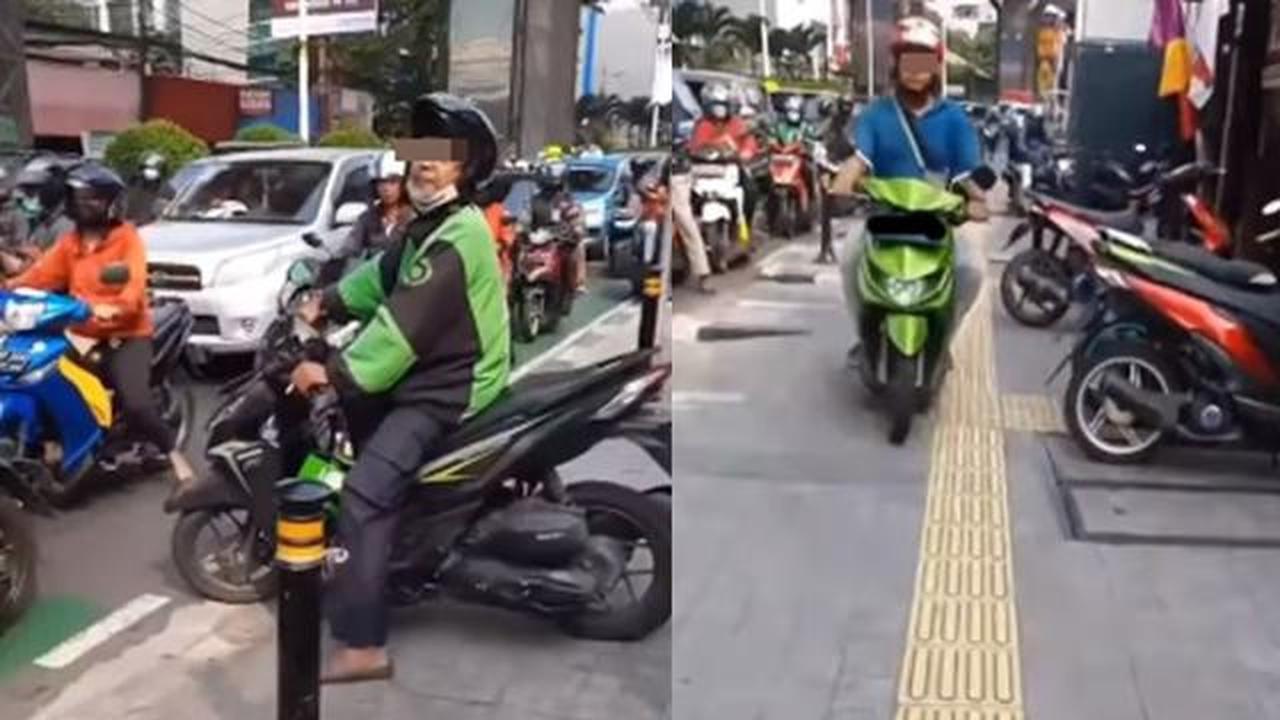 Pemotor nekat melintas di trotoar (Instagram/@fakta.jakarta)