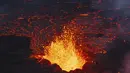 Sebuah gunung berapi meletus di barat daya Islandia Pada Senin (18/12/2023) malam, memuntahkan lava dan asap yang meluas. (AP Photo/Marco Di Marco)