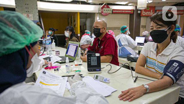 FOTO: Program Vaksinasi COVID-19 Jadi Optimisme Pertumbuhan Ekonomi 2021