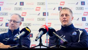 Pelatih tim nasional Islandia, Lars Lagerback (kiri) dan Heimir Hallgrimsson (kanan). (AFP/Laurie Dieffembacq).