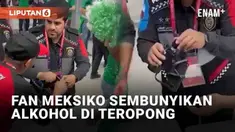 Aturan ketat di Piala Dunia 2022 Qatar membuat penggemar harus menahan diri. Salah satunya adalah pelarangan alkohol di area stadion. Namun fan Meksiko ini berusaha mengelabui petugas keamanan dengan memasukkan alkohol dalam teropong.