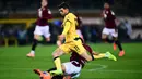 Pulisic menjadi pahlawan kemenangan Milan meski baru masuk pada babak kedua. Borong dua gol yang memastikan Rossoneri pulang dengan kemenangan 3-2. (AFP/Marco Bertorello)