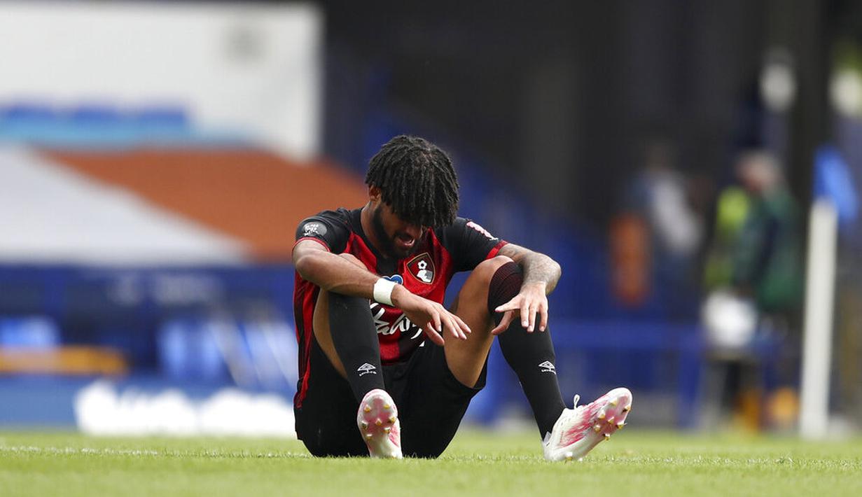 Bournemouth - Kemenangan 3-1 atas Everton di pekan terakhir Premier League menjadi sia-sia. Finis di peringkat ke-18 di akhir Premier League membuat Bournemouth harus degradasi karena kalah satu poin dari Aston Villa. (Tim Goode/Pool via AP)