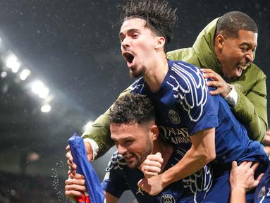 PSG sukses mengalahkan Manchester City dengan skor 4-2 dalam laga matchday 7 League Phase Liga Champions 2024/2025 yang digelar di Parc des Princes, Kamis (23/1/2025) dini hari WIB. (AP Photo/Michel Euler)
