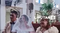 Kasih tak lapuk oleh hujan, tak lekang oleh banjir. Sepasang kekasih di Filipina, Leian Lieza Galang dan Gilbert Chico, nekat mengikat janji suci di Gereja Saint John the Baptist, Hagonoy, yang tengah terendam banjir pada Selasa (1/9/2026).

Pernikahan unik ini berlangsung di tengah hujan monsun ...