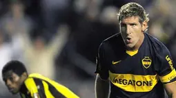 Aksi striker Boca Juniors, Martin Palermo seusai mencetak go ke gawang Deportivo Tachira (Venezuela) di laga Libertadores Cup Grup 2 yang digelar di La Bombonera Stadium, Buenos Aires, 30 April 2009. AFP PHOTO/Juan Mabromata 