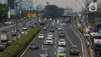 Sejumlah kendaraan melintas di tol dalam kota Gatot Subroto, Jakarta, Selasa  (14/5/2024). (Liputan6.com/Angga Yuniar)