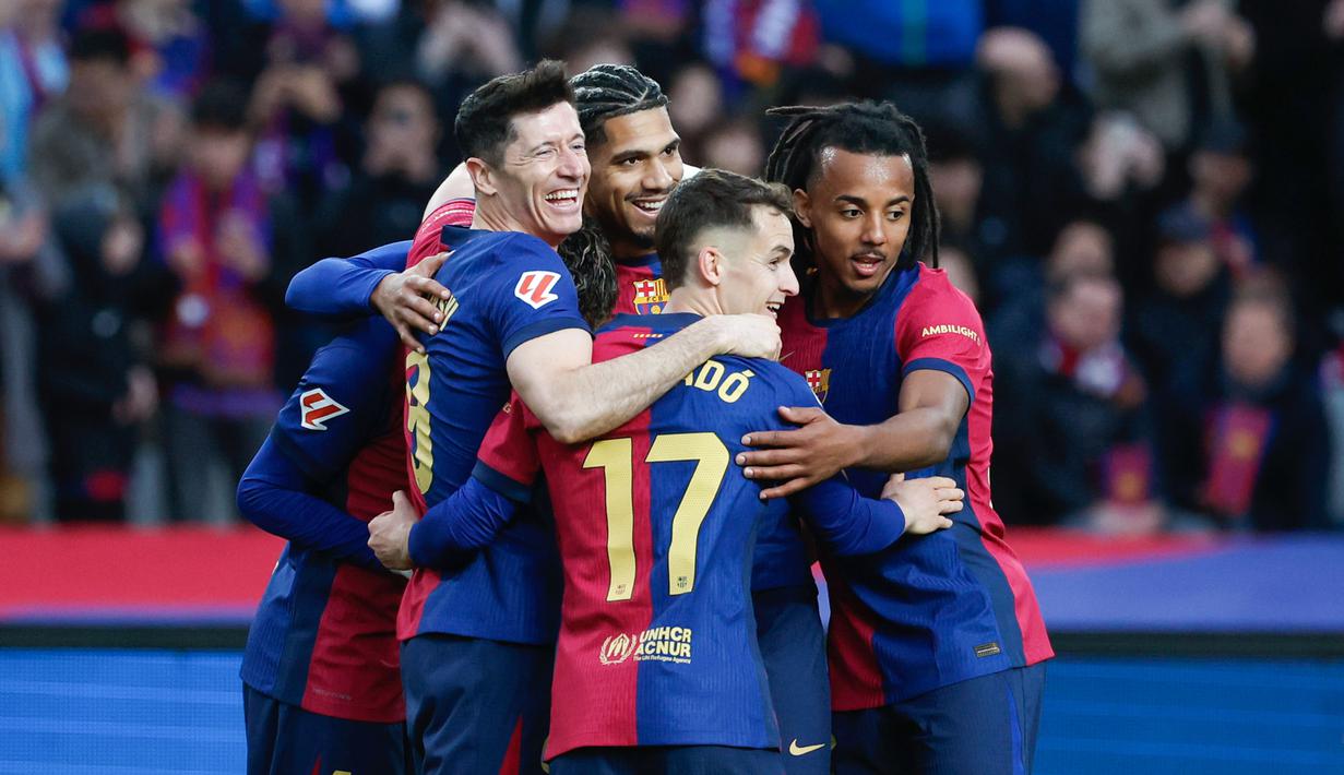 Barcelona pesta gol ke gawang Real Sociedad di laga pekan ke-26 Liga Spanyol 2024/2025 di Estadi Olimpic Lluis Companys, Minggu (02/03/2025) malam WIB. Hasil ini membuat Barcelona kembali naik ke pucuk klasemen sementara La Liga 2024/2025 dengan koleksi 57 angka dari 26 pertandingan. (AP Photo/Joan Monfort)