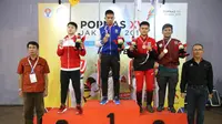 Yudha Fadillah Pratama, karateka asal Jawa Barat, meraih emas pada final nomor kata perorangan putra POPNAS 2019 yang berlangsung di Gelanggang Remaja Cempaka Putih, Minggu (17/11/19). (Foto: Dispora Jabar)