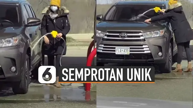 Sebuah video viral merekam seorang wanita mencuci mobilnya.